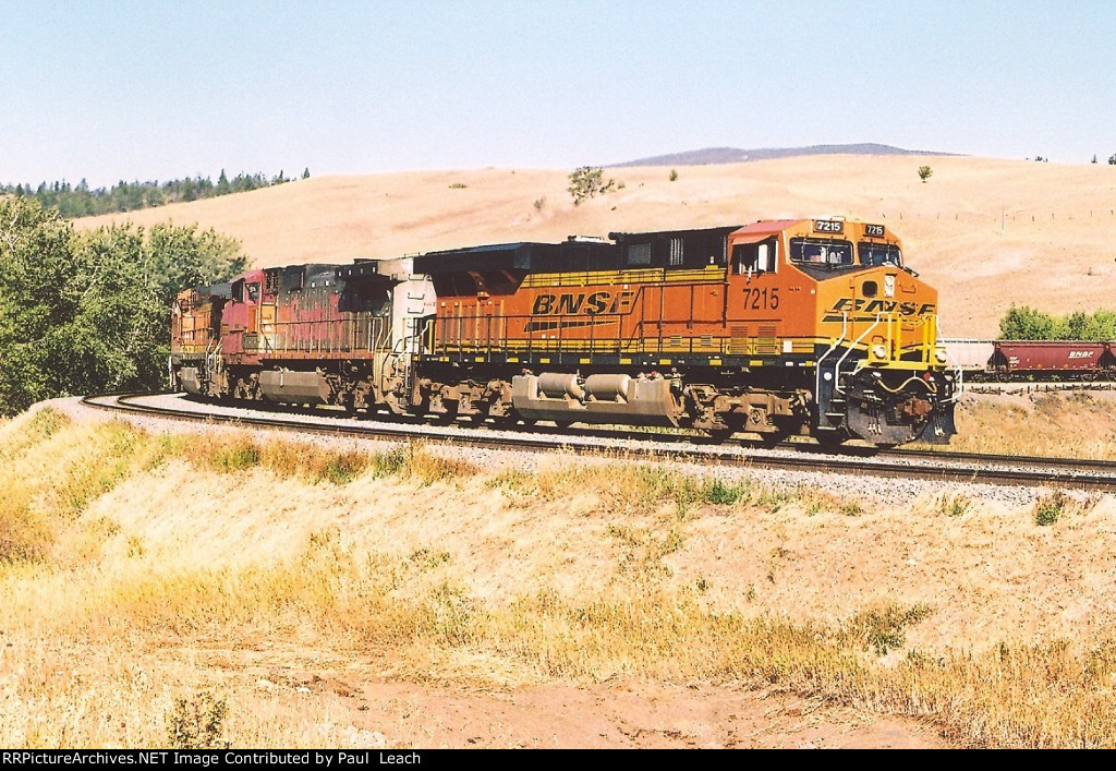 Eastbound grain train eases down the grade